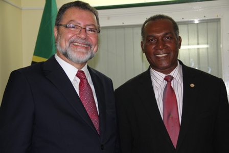 Premier of Nevis Hon. Vance Amory (r) and Brazilian Ambassador to St. Kitts and Nevis based in Basseterre His Excellency Antonio Jose Rezende de Castro at the Premier's Bath Hotel Office